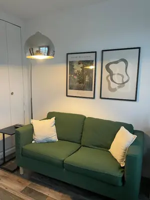 Coin salon dans l'établissement Charmant appartement vue sur Seine - Hyper Centre de Rouen