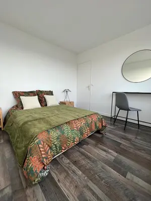 Un ou plusieurs lits dans un hébergement de l'établissement Charmant appartement vue sur Seine - Hyper Centre de Rouen