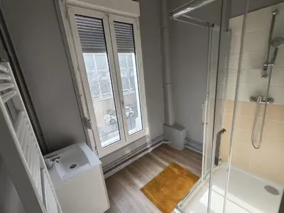 Salle de bains dans l'établissement Le Paladium
