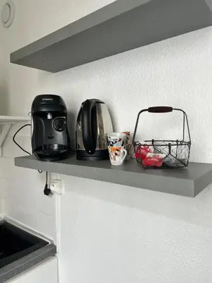 Cuisine ou kitchenette dans l'établissement Studio Rouen proche CHU
