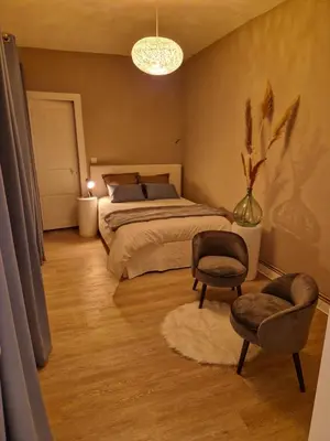 Un ou plusieurs lits dans un hébergement de l'établissement Maison Etoiles