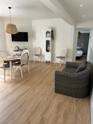 Coin salon dans l'établissement Gite MIRABELLE