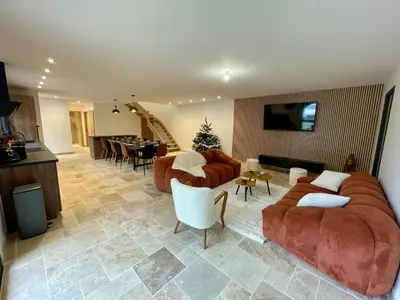 Télévision ou salle de divertissement dans l'établissement Gîte de l'Epinay Myrtille