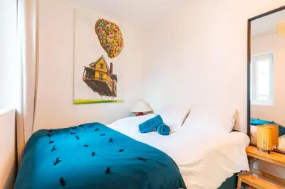 Un ou plusieurs lits dans un hébergement de l'établissement Studio chez Manon élégant studio Cormeilles en Parisis