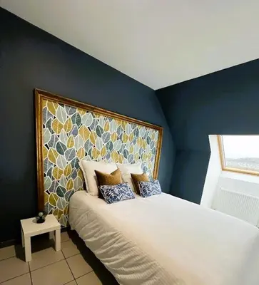 Un ou plusieurs lits dans un hébergement de l'établissement Maison Panorama avec terrasse exposition sud