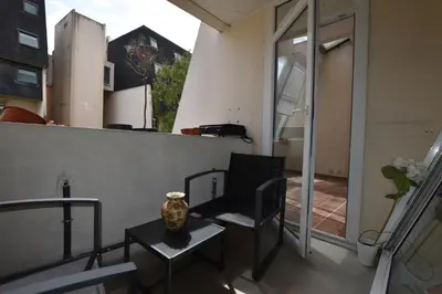 Coin salon dans l'établissement Vaste Appartement dupleix 3 chambre proche Stade de France
