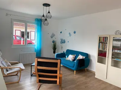 Coin salon dans l'établissement Le rendez-vous des 2 amants