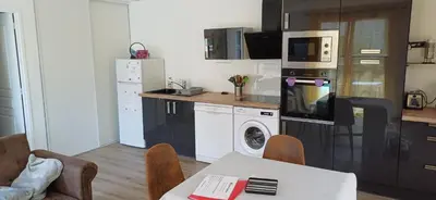Cuisine ou kitchenette dans l'établissement Gite de l'artiste