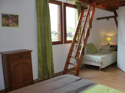 Un ou plusieurs lits dans un hébergement de l'établissement Gîte Gîtes de France® - Le Pressoir