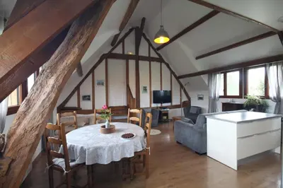 Télévision ou salle de divertissement dans l'établissement Gîte Gîtes de France® - Le Pressoir