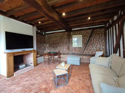 Télévision ou salle de divertissement dans l'établissement Gîte Gîtes de France® - Ferme des Marronniers