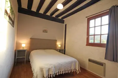 Un ou plusieurs lits dans un hébergement de l'établissement Gîte Gîtes de France® - Manoir des Méandres