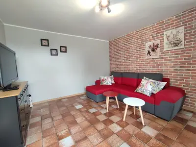 Coin salon dans l'établissement Gîte Gîtes de France® - Le Gîte de la Forêt