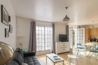 Télévision ou salle de divertissement dans l'établissement Gîte Gîtes de France® - L'Evasion