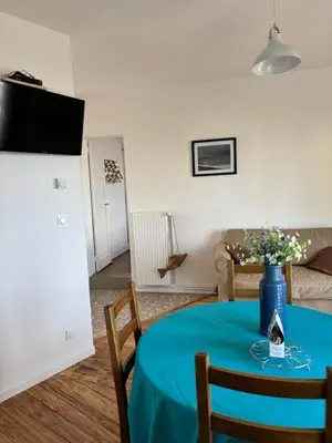 Télévision ou salle de divertissement dans l'établissement Gîte Gîtes de France® - Le Balcon