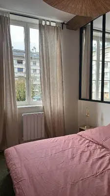 Un ou plusieurs lits dans un hébergement de l'établissement Appartement douillet en centre ville !