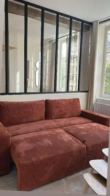 Coin salon dans l'établissement Appartement douillet en centre ville !