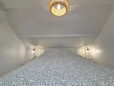 Un ou plusieurs lits dans un hébergement de l'établissement Maison de Ville Climatisée à 10 minutes de Rouen