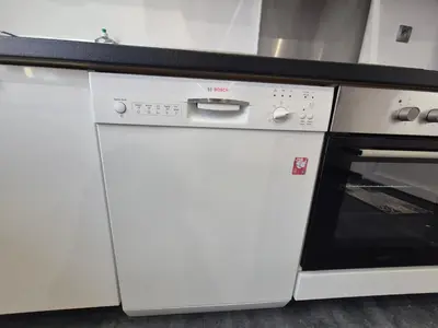 Cuisine ou kitchenette dans l'établissement Maison de Ville Climatisée à 10 minutes de Rouen