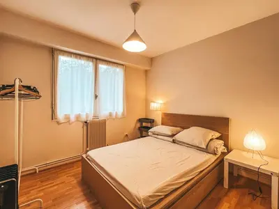 Un ou plusieurs lits dans un hébergement de l'établissement Quiet apartment Place Marine center Maisons Laffitte