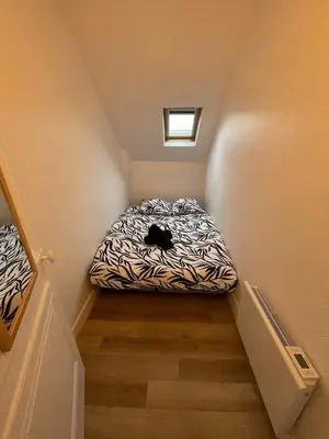 Un ou plusieurs lits dans un hébergement de l'établissement Cozy, fully equipped apartment - Downtown Rouen - 3 people