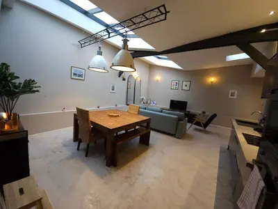 Coin salon dans l'établissement Loft moderne avec garage dans l'hyper centre