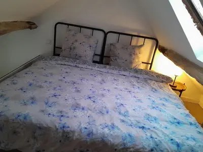 Un ou plusieurs lits dans un hébergement de l'établissement Escapade & Bien être
