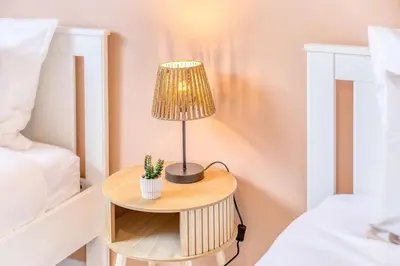 Un ou plusieurs lits dans un hébergement de l'établissement Appartement 6prs - Hyper Centre - Idéal famille et pro