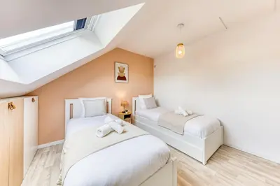 Un ou plusieurs lits dans un hébergement de l'établissement Appartement 6prs - Hyper Centre - Idéal famille et pro