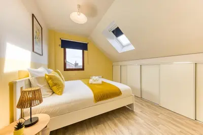 Un ou plusieurs lits dans un hébergement de l'établissement Appartement 6prs - Hyper Centre - Idéal famille et pro