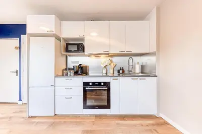 Cuisine ou kitchenette dans l'établissement Appartement 6prs - Hyper Centre - Idéal famille et pro