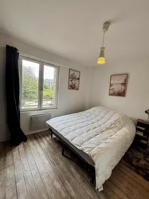 Un ou plusieurs lits dans un hébergement de l'établissement Maison avec terrasse au cœur de Dieppe