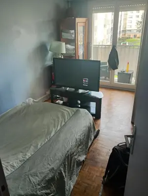 Télévision ou salle de divertissement dans l'établissement Location appartement