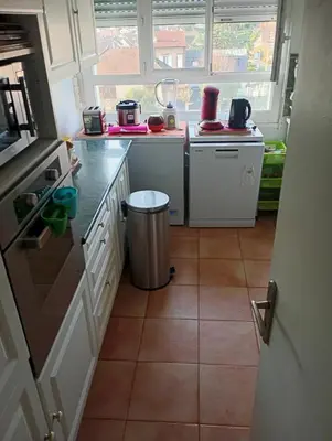 Cuisine ou kitchenette dans l'établissement Location appartement