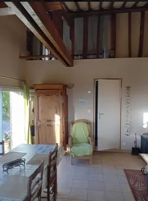 Coin salon dans l'établissement Gîte la chouette hulotte