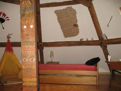 Un ou plusieurs lits dans un hébergement de l'établissement Holiday Home Unterkunft auf dem Bauernhof La printanière - Die Frühlingsfrau by Interhome