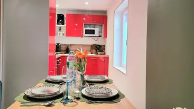 Cuisine ou kitchenette dans l'établissement Le Duplex du Moulin - Maison T2 cosy centre-ville