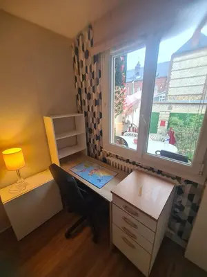 Un ou plusieurs lits dans un hébergement de l'établissement Maison Jardin des Plantes