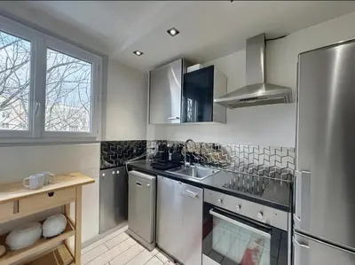 Cuisine ou kitchenette dans l'établissement Appartement