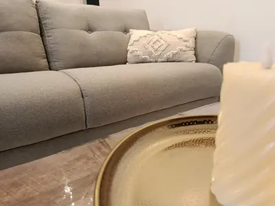 Coin salon dans l'établissement Le Trèfle Doré T2, wifi, private parking space, fêtes interdites