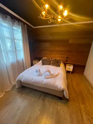 Un ou plusieurs lits dans un hébergement de l'établissement Auvers Wood lodge