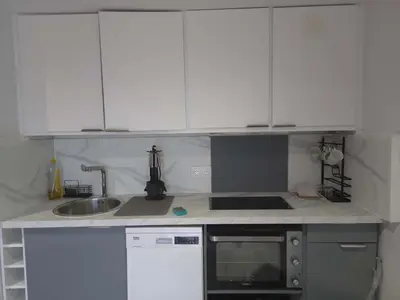 Cuisine ou kitchenette dans l'établissement Echappée Ennery
