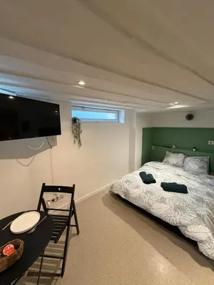 Un ou plusieurs lits dans un hébergement de l'établissement Studio Cosy Place Vieux Marché