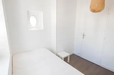 Un ou plusieurs lits dans un hébergement de l'établissement 3 Appart hôtel Chambre privée avec espace commun centre Rouen Linge et ménage inclus Chambre privée