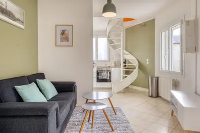 Coin salon dans l'établissement Louis maison de ville en copro