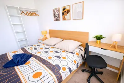 Un ou plusieurs lits dans un hébergement de l'établissement Spacieux et moderne 3 chambres a 10 min de Rouen