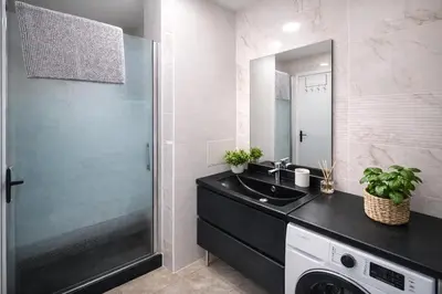 Cuisine ou kitchenette dans l'établissement Spacieux et moderne 3 chambres a 10 min de Rouen