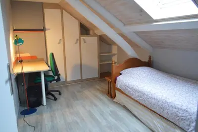 Un ou plusieurs lits dans un hébergement de l'établissement Aéroport à 500 mètres, chambre