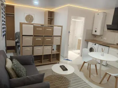 Cuisine ou kitchenette dans l'établissement Studio Neuf Aubergenville