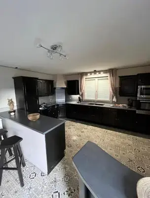Cuisine ou kitchenette dans l'établissement Gîte familiale au cœur d un centre équestre